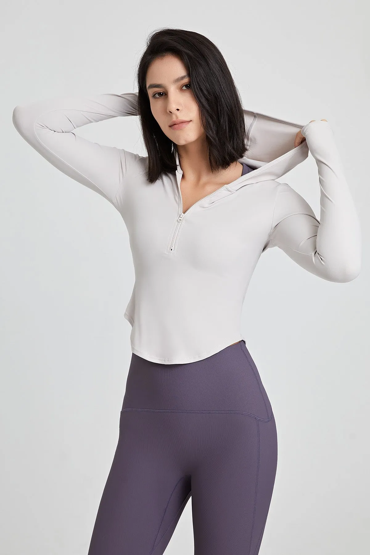 Fitted Half-Zip Crop Hoodie with Thumb Holes