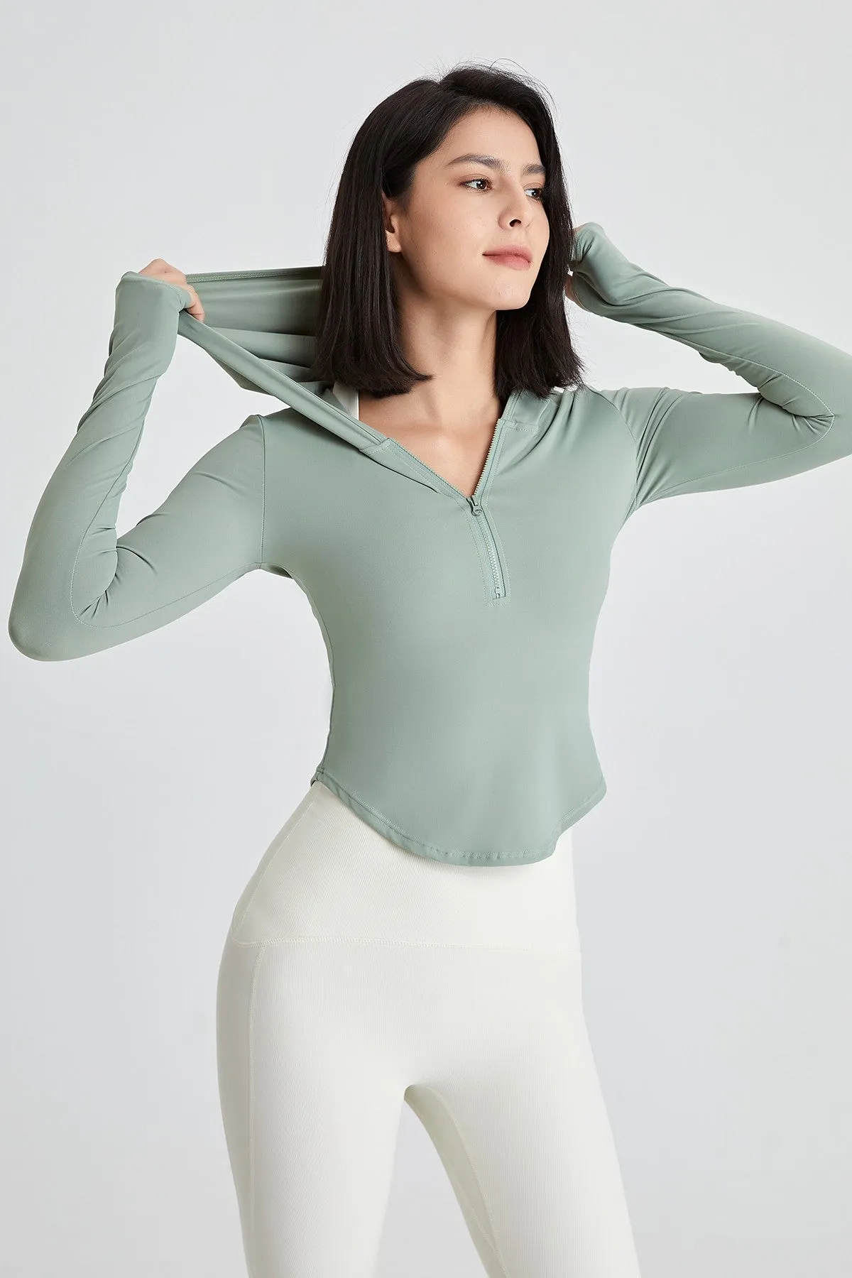 Fitted Half-Zip Crop Hoodie with Thumb Holes