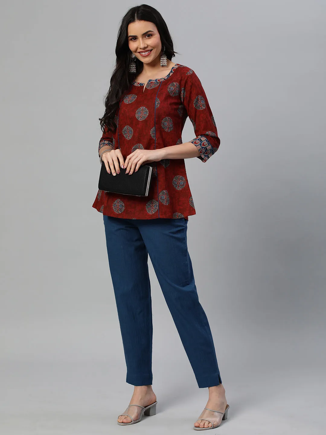 Khoobsurat - A flared tunic with slit and printed collar and sleeve cuff.