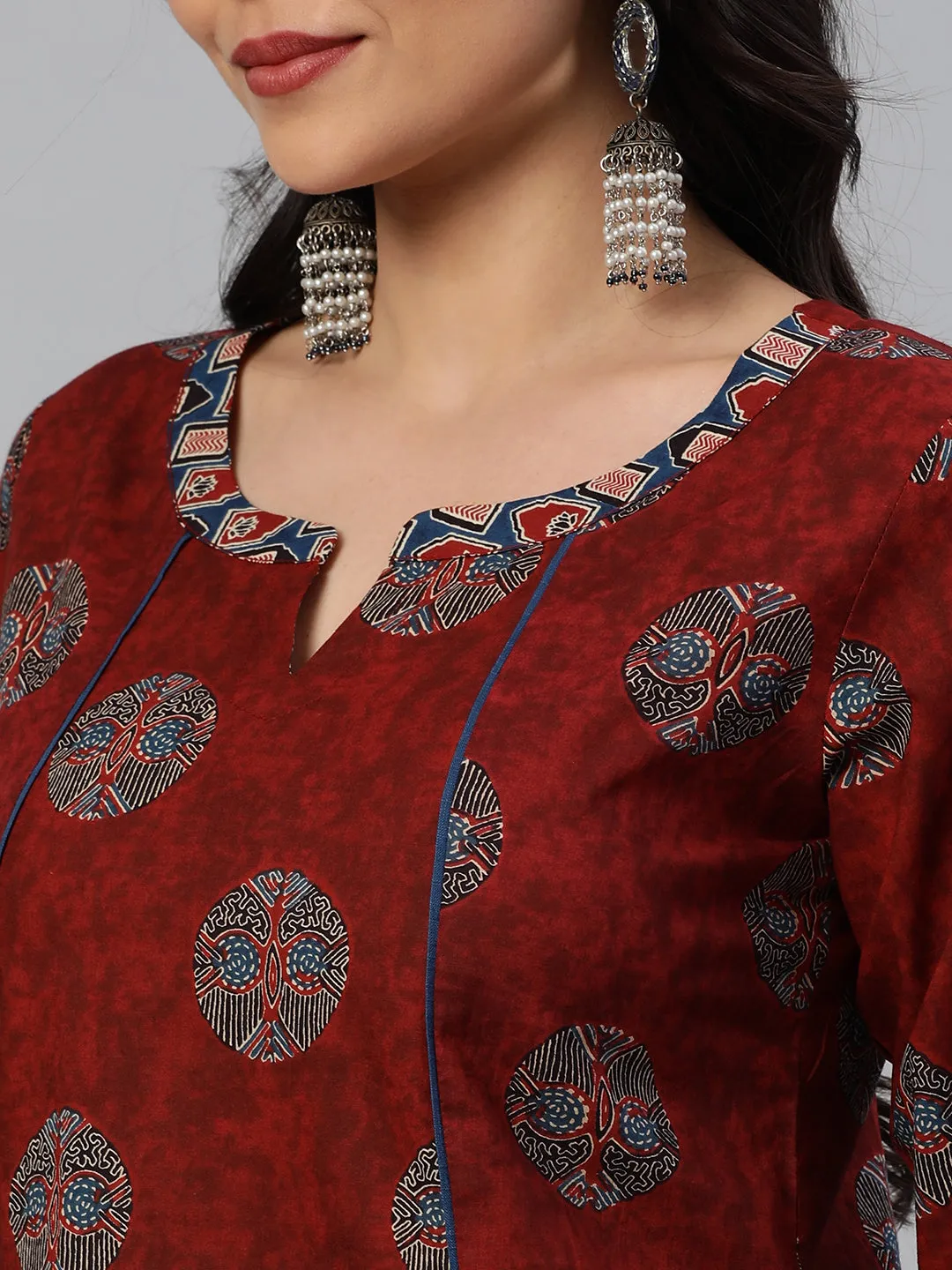 Khoobsurat - A flared tunic with slit and printed collar and sleeve cuff.