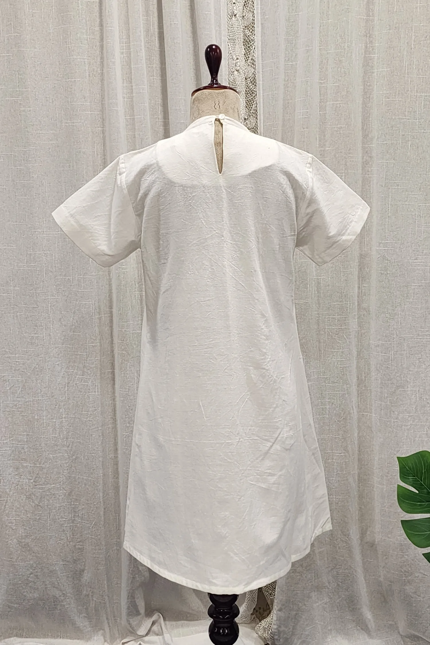 White handspun and handwoven pleated tunic